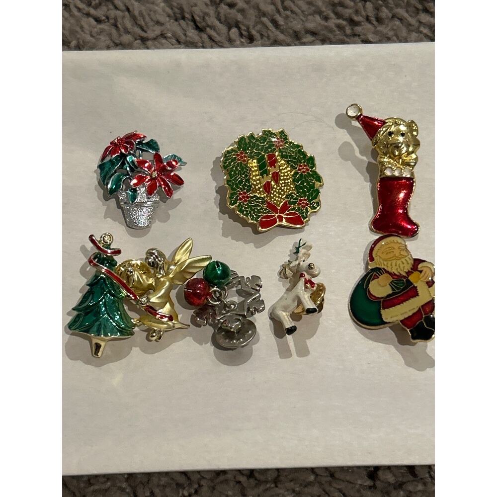 Lot of seven Christmas Pins/Brooches